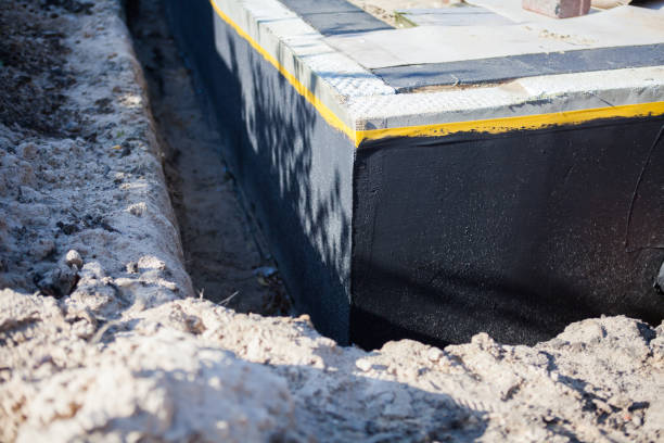 Professional Waterproofing technician working in North Babylon, NY